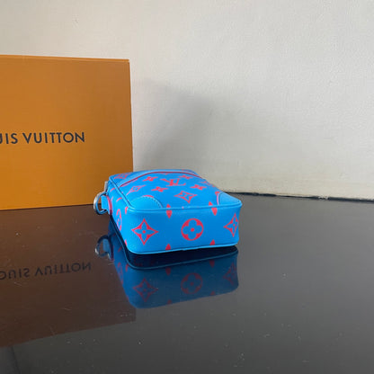 Eye Catching Blue Louis Vuitton Crossbody Bag With Red Monogram Pattern And Adjustable Strap