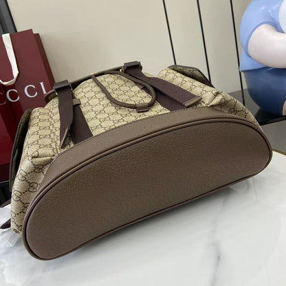 Classic Gucci Backpack With Iconic GG Pattern Web Stripe And Gold Accents For Timeless Style 839110