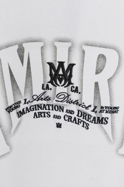 AMIRI White/Black Graphic Tee With Bold Logo For Trendy Streetwear Enthusiasts