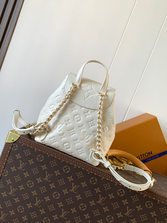 Elegant Louis Vuitton White/Black/Pink Embossed Leather Backpack With Functional Pockets And Gold Accents