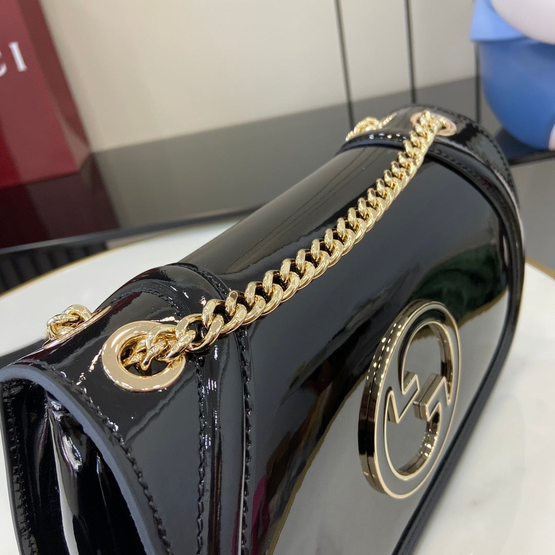 Gucci Black Patent Leather Shoulder Bag With Gold Tone Interlocking G Logo And Chain Strap 815715