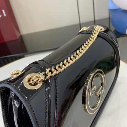 Gucci Black Patent Leather Shoulder Bag With Gold Tone Interlocking G Logo And Chain Strap 815715