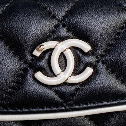 Chanel Quilted Black Leather Mini Backpack with White Trim and Gold - Tone Chain Straps AP4514