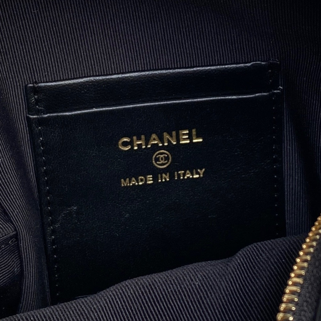 Chanel Quilted Black Leather Mini Backpack with White Trim and Gold - Tone Chain Straps AP4514