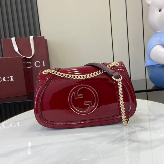 Gucci Black Patent Leather Shoulder Bag With Gold Tone Interlocking G Logo And Chain Strap 815715