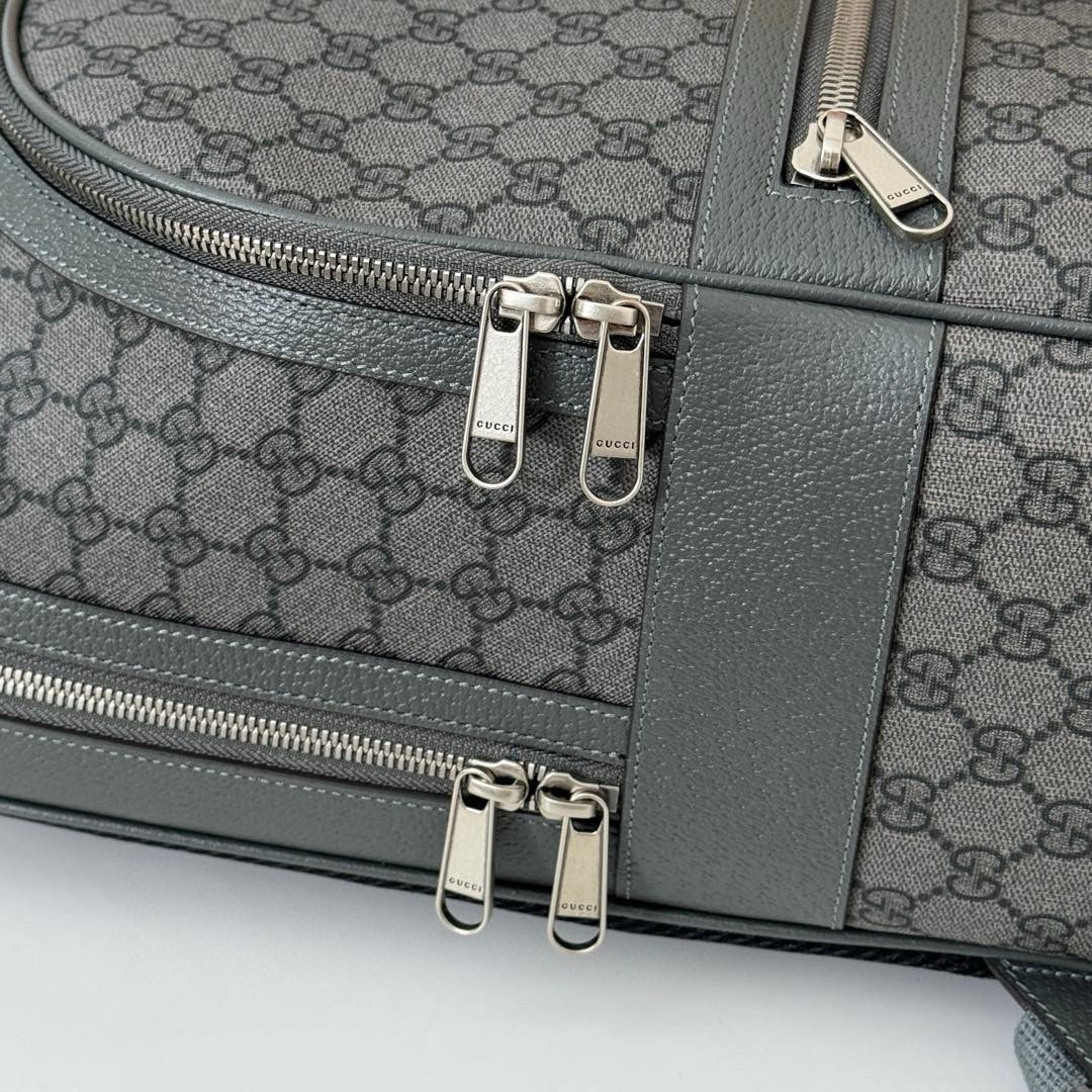 Fashionable Gray Gucci Backpack With Signature GG Pattern And Functional Design 821938