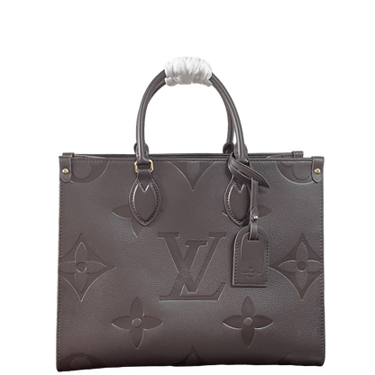 Elegant Louis Vuitton Gray Embossed Leather Tote Bag With Signature Monogram Patterns