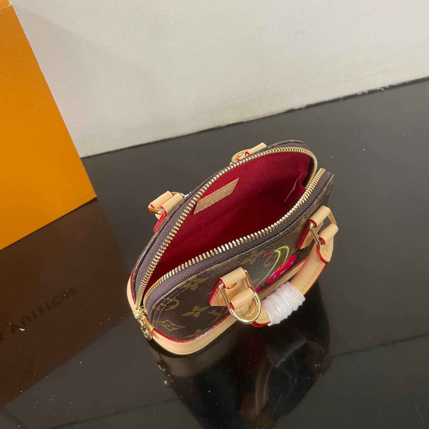 Adorable Louis Vuitton Alma BB Bag With Cherry Motif For Fashion Enthusiasts