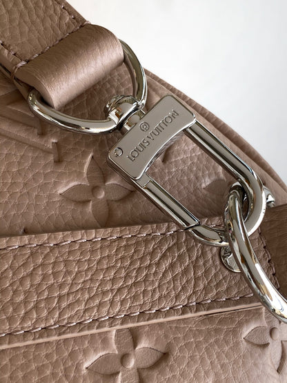 Louis Vuitton Embossed Leather Keepall Bandoulière Bag in Beige for Luxury Travel and Style