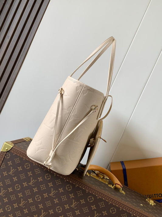 Elegant Louis Vuitton Cream Empreinte Leather Neverfull Tote Bag for Fashion Enthusiasts