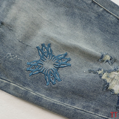 Amiri Light Blue Distressed Jeans With Colorful Embroidered Patterns