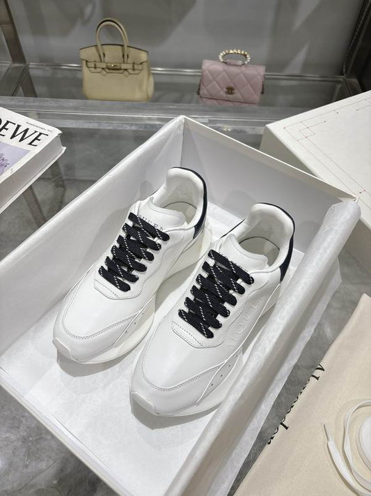 Stylish Alexander McQueen Oversized Sneakers In White And Navy For Fashion Forward Individuals