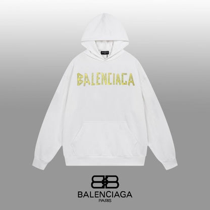 Balenciaga Black/White Hoodie With Distressed Gold Logo For Edgy Streetwear Style