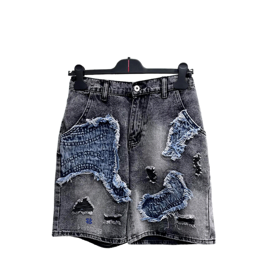 Balenciaga Distressed Patchwork Denim Shorts With Vintage Style