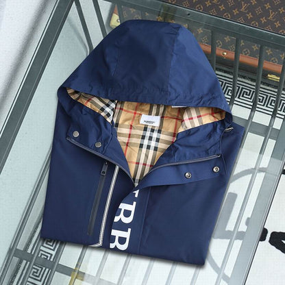 Burberry Blue Hooded Jacket With Bold Brand Lettering