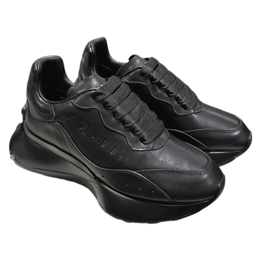 Sleek All Black Alexander McQueen Oversized Sneakers For Timeless Street Style