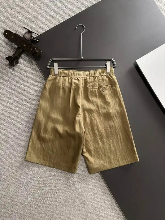 Dolce & Gabbana Beige Shorts With Brand Embroidered Patch