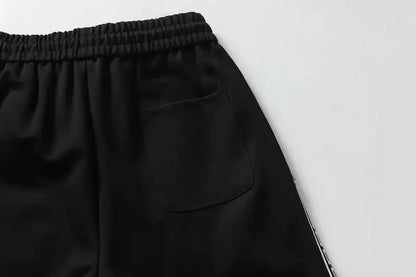 Givenchy Men's Black Shorts with Greek Key Pattern Details