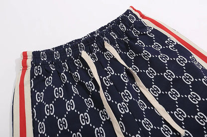 Gucci Men's Navy Blue GG Print Shorts with Web Stripe Details