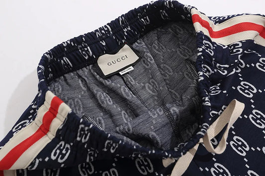 Gucci Men's Navy Blue GG Print Shorts with Web Stripe Details