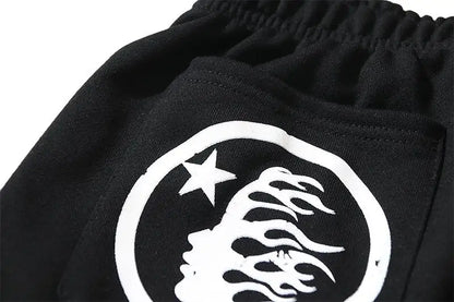 Hellstar Men's Black Drawstring Shorts with White Flame Graphics