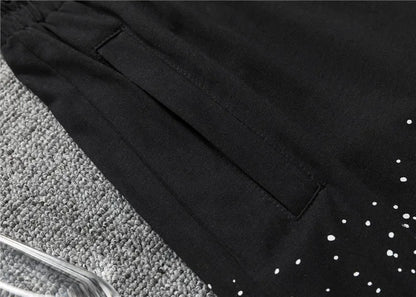 Louis Vuitton Men's Black Drawstring Shorts with White Spray Print