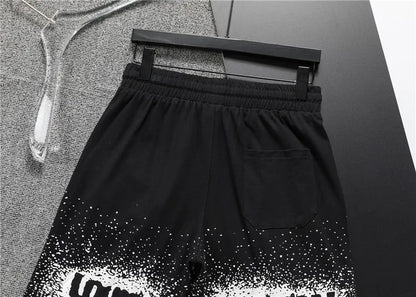 Louis Vuitton Men's Black Drawstring Shorts with White Spray Print