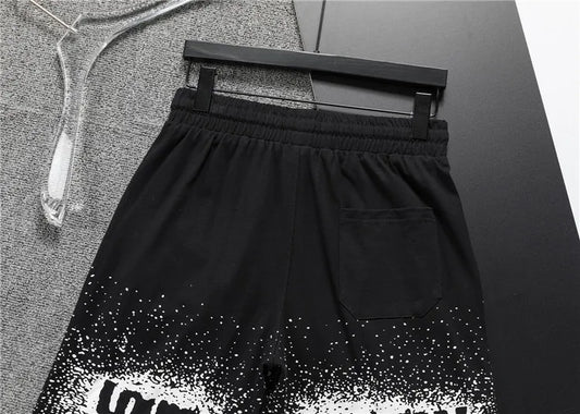 Louis Vuitton Men's Black Drawstring Shorts with White Spray Print