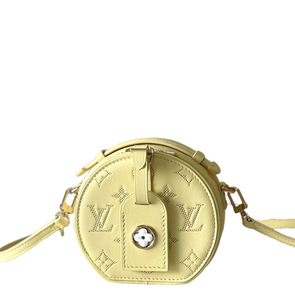 Chic Yellow LV Embossed Round Crossbody Bag With Adjustable Strap And Signature Details