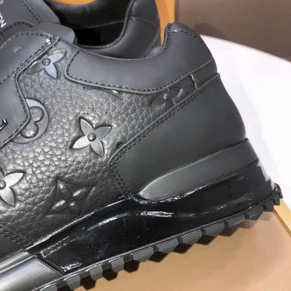 Louis Vuitton Men's Black Embossed Logo Sneakers With Premium Craftsmanship