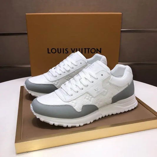 Louis Vuitton Men's Black Embossed Logo Sneakers With Premium Craftsmanship