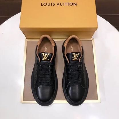 Louis Vuitton Men's Black Leather Sneakers With Embossed Logo And Contrast Details