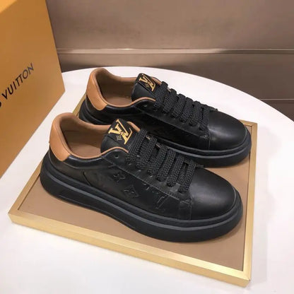 Louis Vuitton Men's Black Leather Sneakers With Embossed Logo And Contrast Details