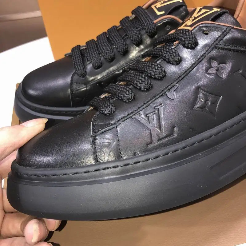 Louis Vuitton Men's Black Leather Sneakers With Embossed Logo And Contrast Details