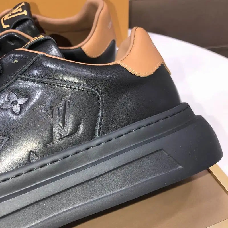 Louis Vuitton Men's Black Leather Sneakers With Embossed Logo And Contrast Details