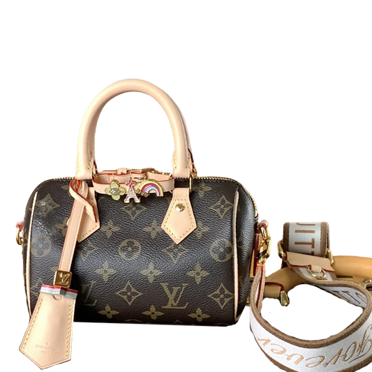 Louis Vuitton Speedy Bandoulière Bag With Colorful Charms And Stylish Strap For Fashion Enthusiasts