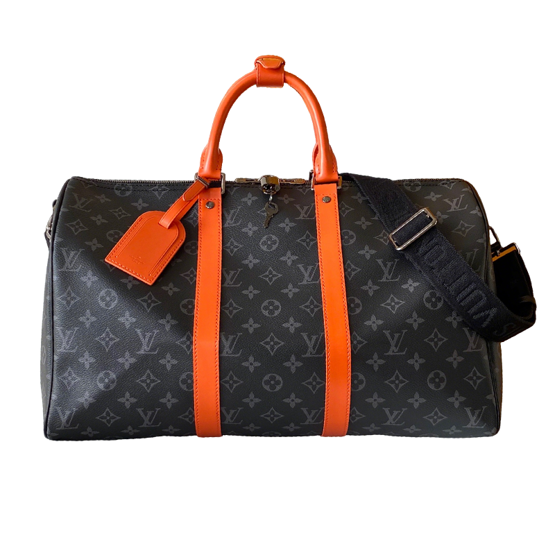Louis Vuitton Monogram Canvas Travel Bag With Vibrant Orange Accents For Stylish Journeys
