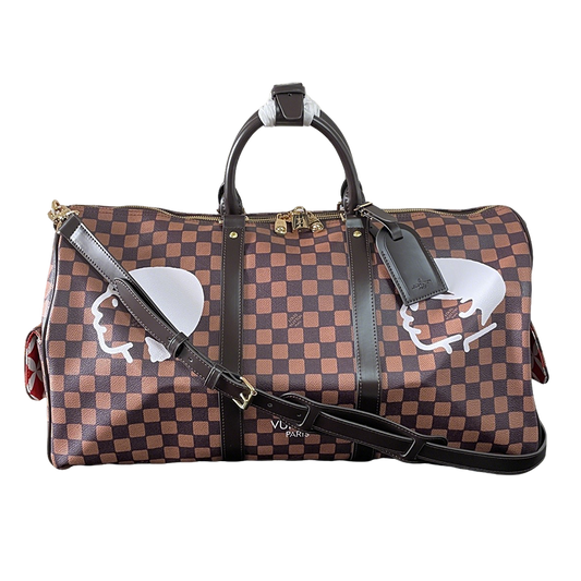 Louis Vuitton Damier Pattern Travel Bag With Unique Graphic Design For Fashion Trips
