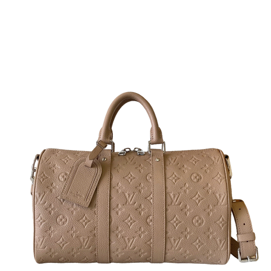 Louis Vuitton Embossed Leather Keepall Bandoulière Bag in Beige for Luxury Travel and Style