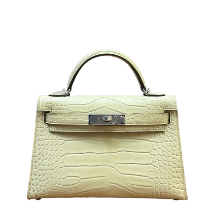 Elegant Hermès Kelly Bag in Cream Crocodile Leather with Strap 1920