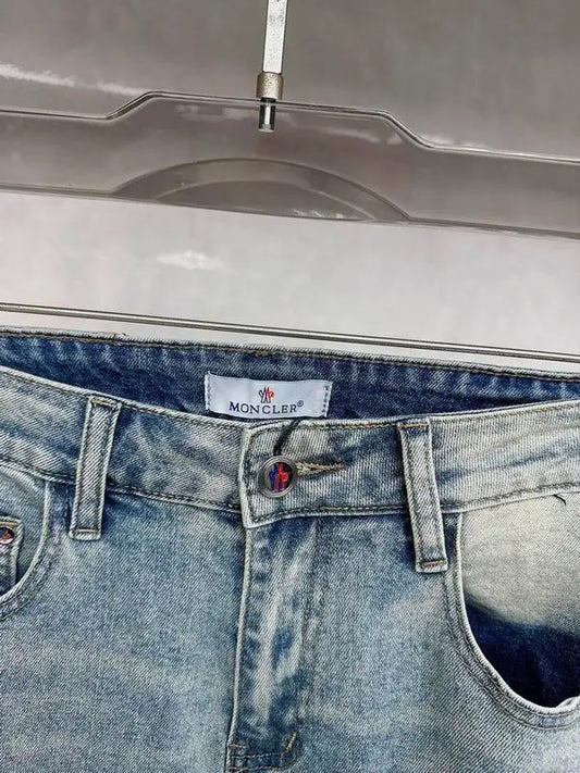 Moncler Men's Jeans with Light Wash and Unique Embroidered Detail
