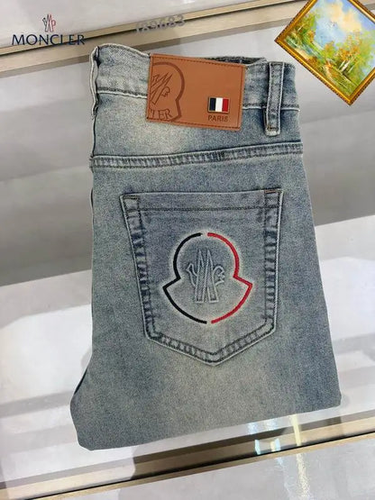 Moncler Men's Jeans with Light Wash and Unique Embroidered Detail