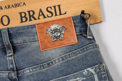 Versace Men's Light Wash Denim Jeans With Signature Embroidered Detail