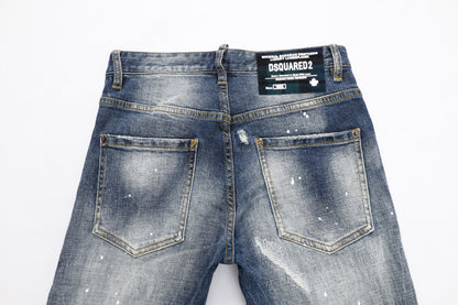 Men's Dsquared2 Blue Denim Jeans with Paint Splatter and Faded Details