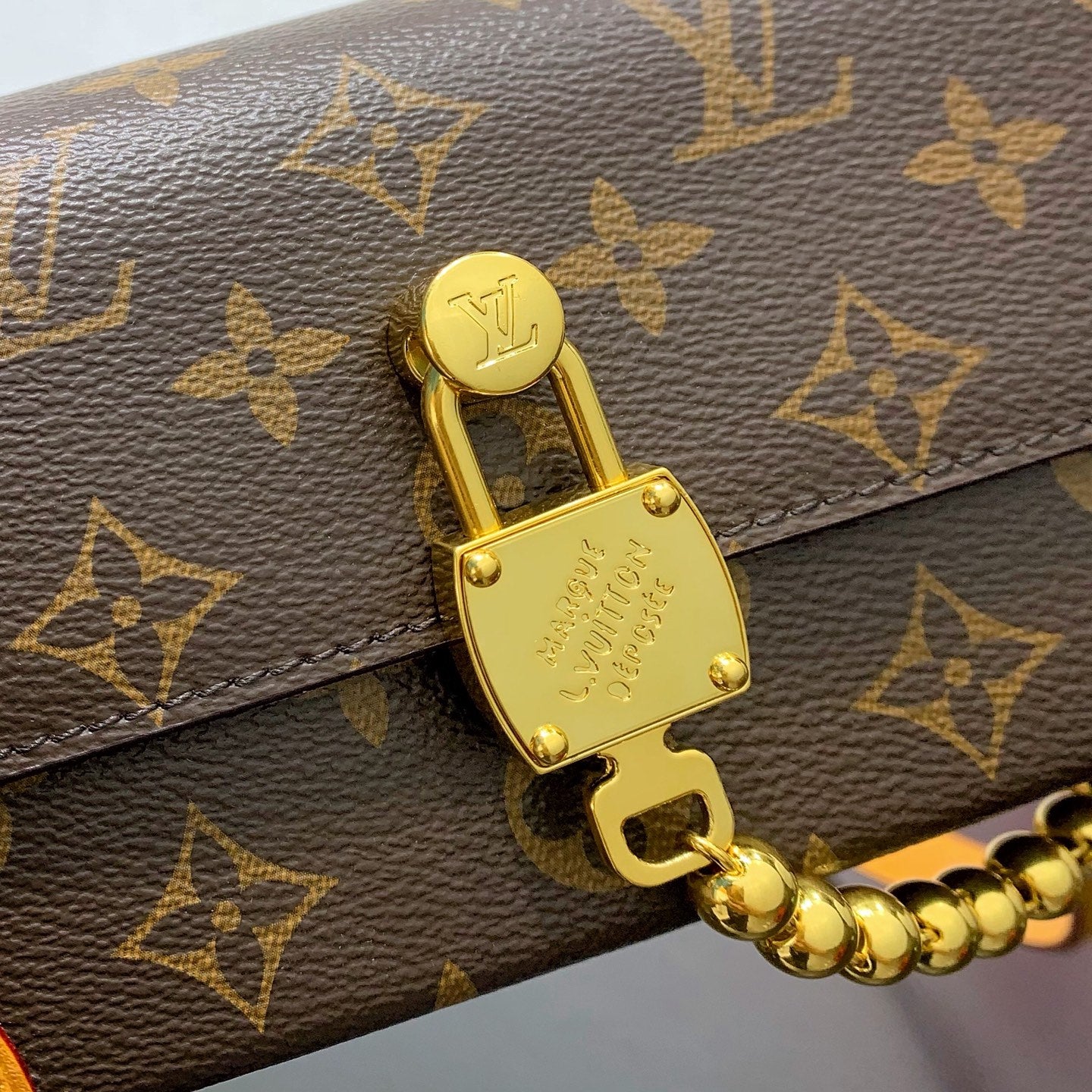 Chic Louis Vuitton Monogram Crossbody Bag With Gold Lock And Bead Chain