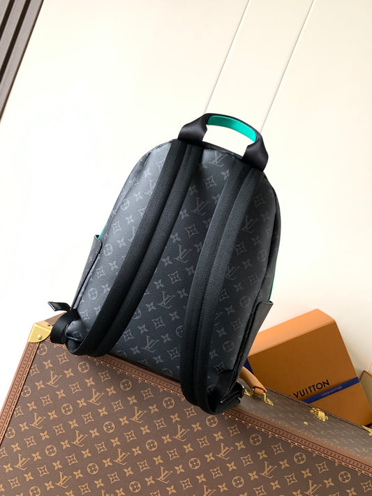 Stylish Louis Vuitton Monogram Backpack With Turquoise Accents And Functional Design
