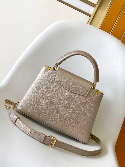 Elegant Louis Vuitton Capucines Mini Bag in Beige Grained Leather with Gold Accents