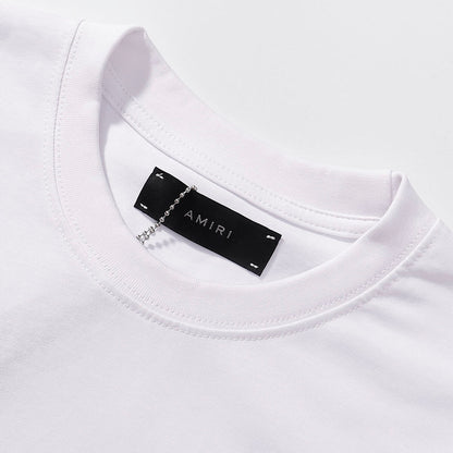 AMIRI Black/White Tee With “I AM what I AM” Slogan For Bold Streetwear Statements