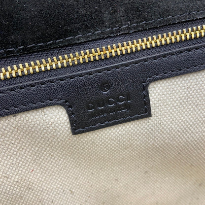 Gucci Black Patent Leather Shoulder Bag With Gold Tone Interlocking G Logo And Chain Strap 815715