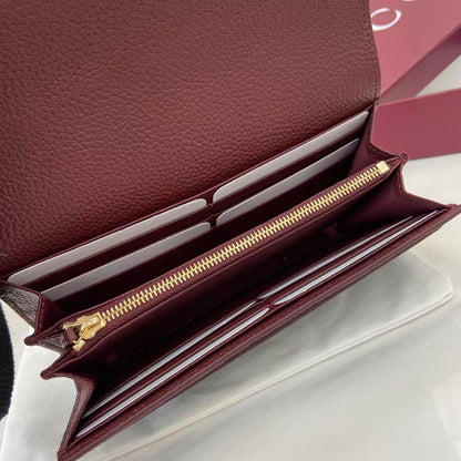 Luxury Black Gucci Long Wallet With Iconic Gold GG Logo And Pebbled Leather Finish 456116